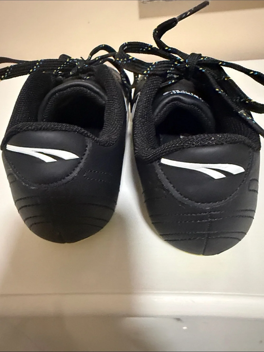 Puma Kids Black Athletic Cleats with Multicolor Speckled Laces